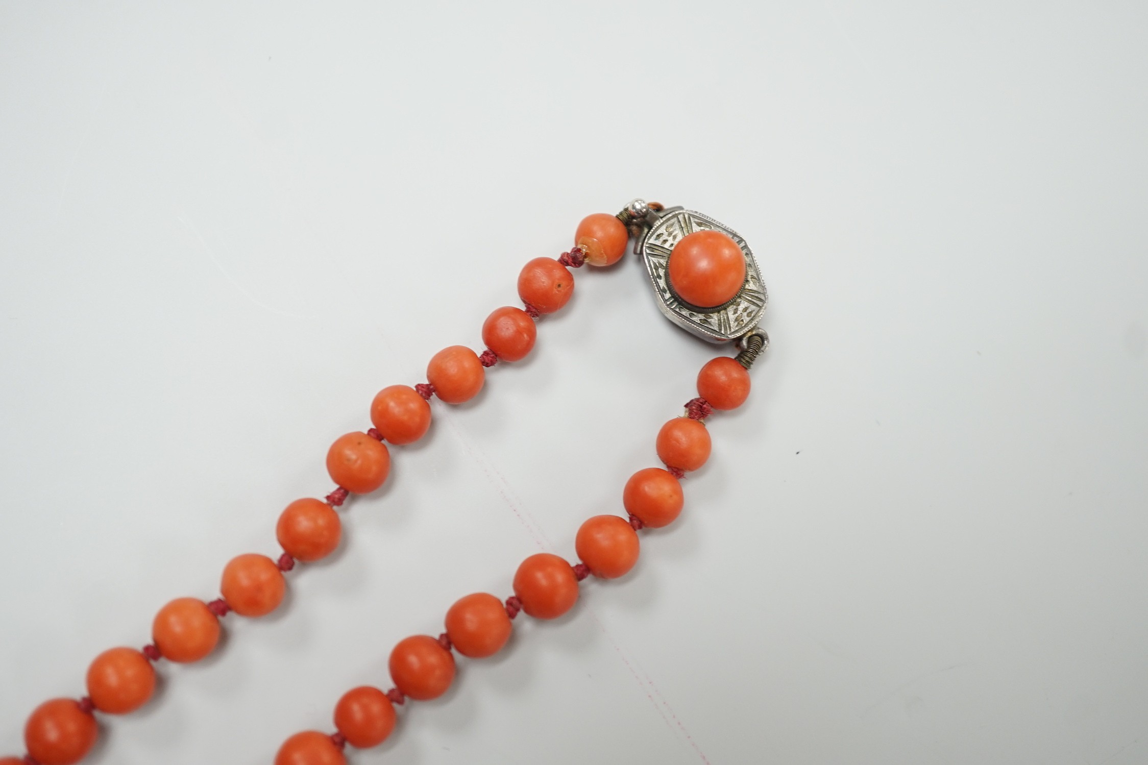 A single strand graduated coral bead necklace, 56cm, gross weight 42 grams.